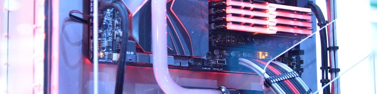 Close-up view of a custom gaming PC with water cooling and LED lights, highlighting advanced technology.